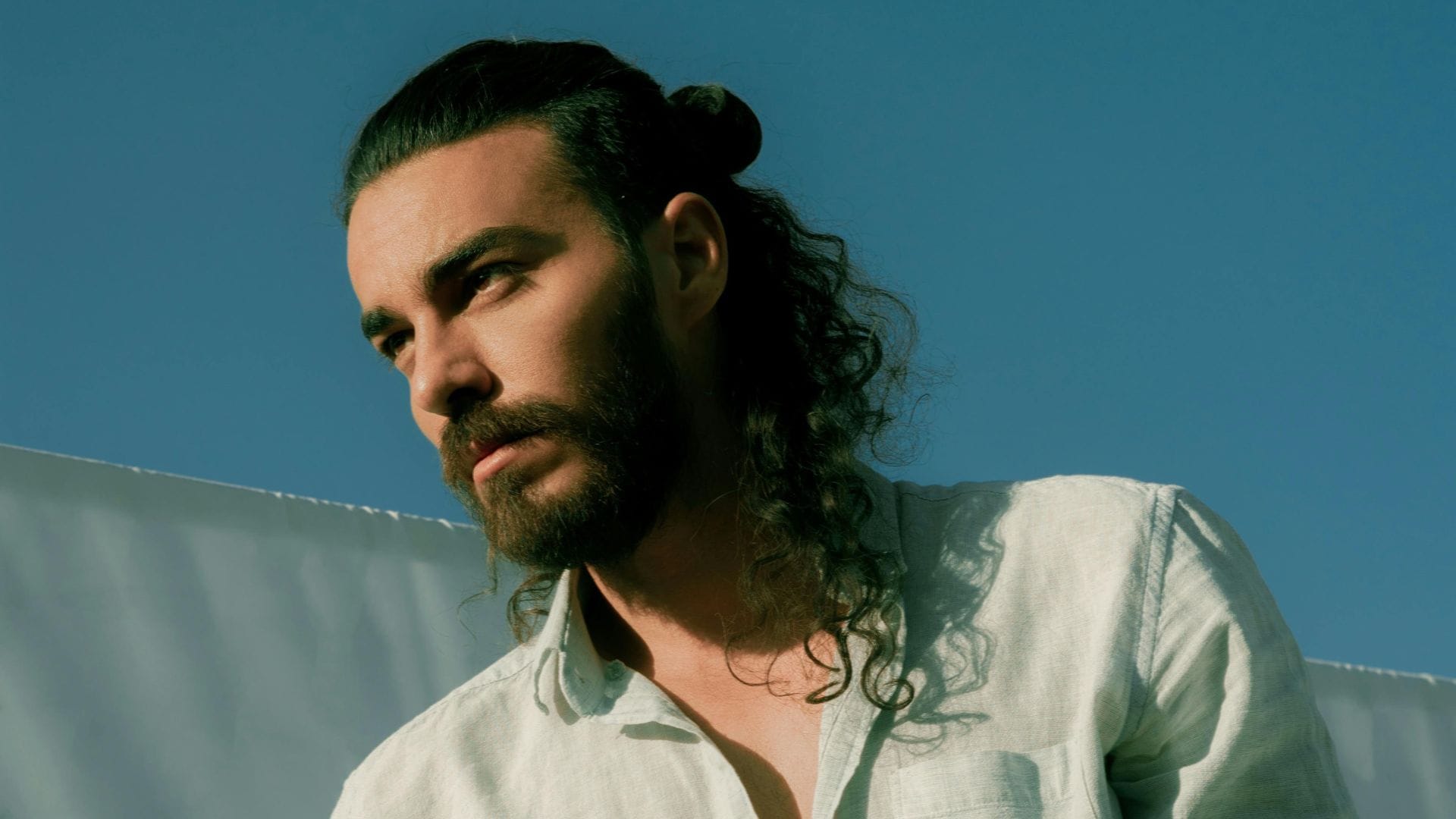 14 Cool Hairstyles for Men with Long Hair